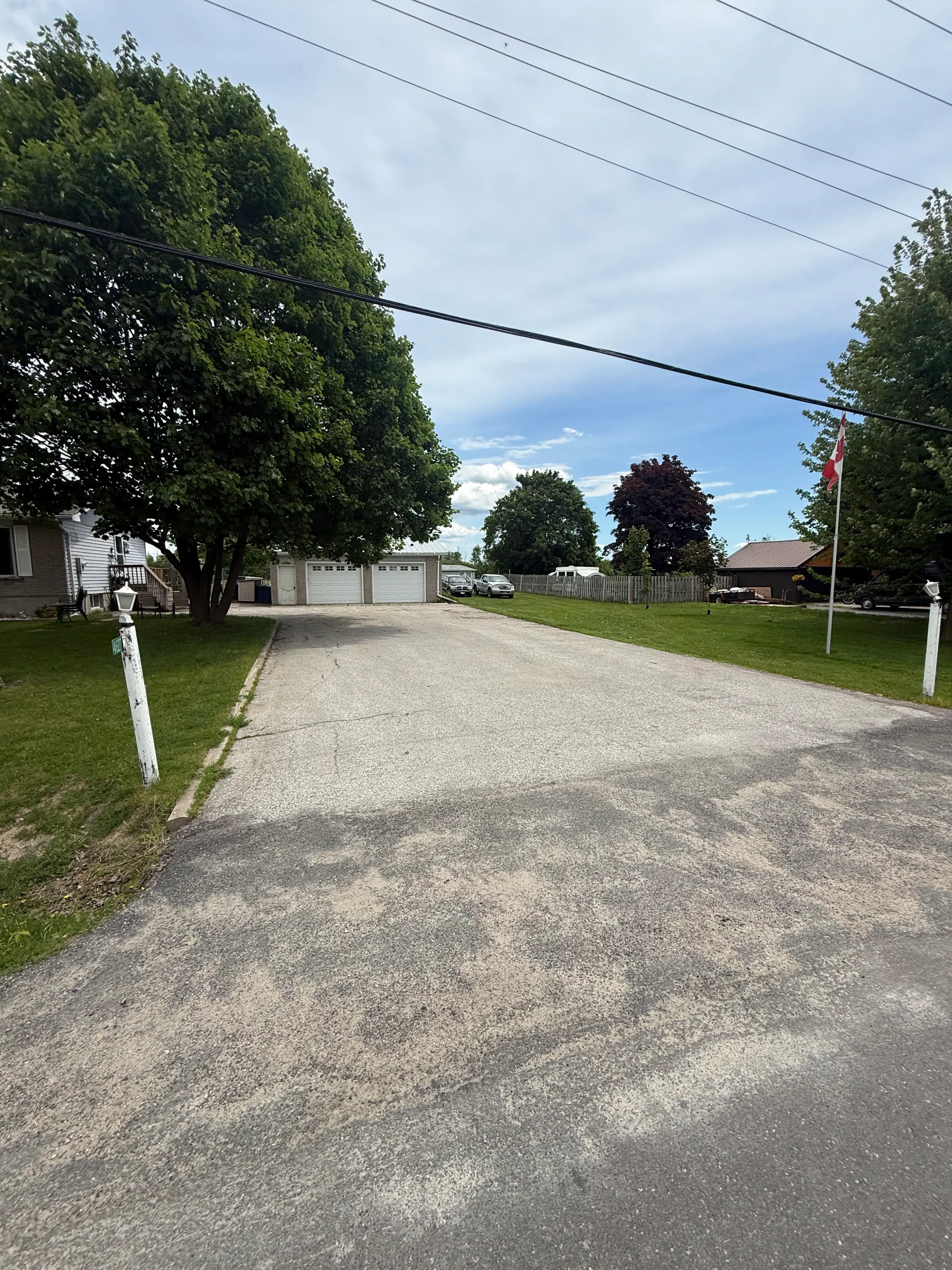 Before driveway sealing at a residential driveway in Orillia,
